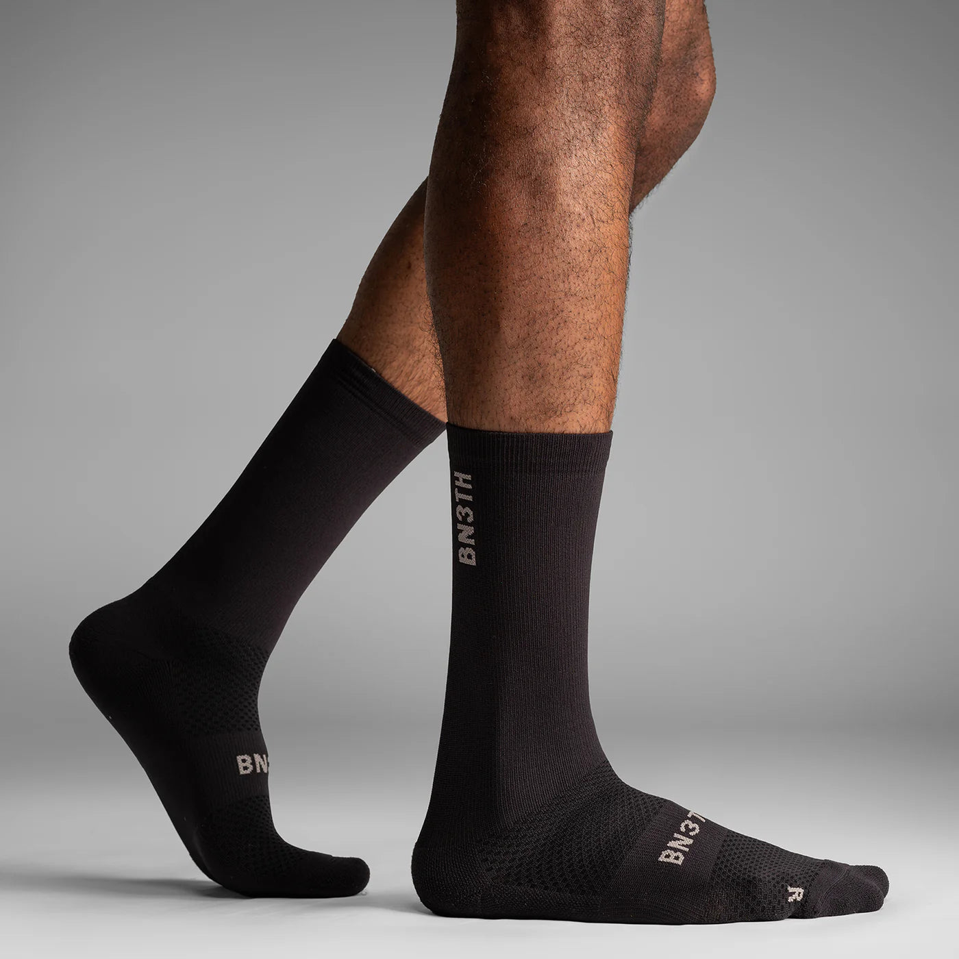 BN3TH_Pro-Crew-Socks_M921004_Black_07_OnModelDetail_1x1_86634412-ed78-4396-8a2b-9f6929708710.webp